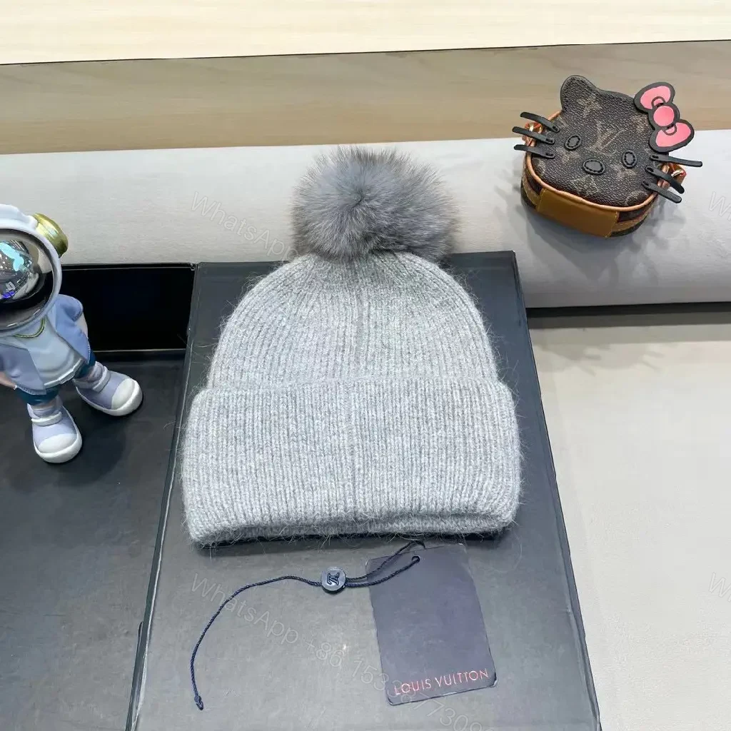 View 5 of Cozy Gray Knit Beanie with LV Emblem Accent