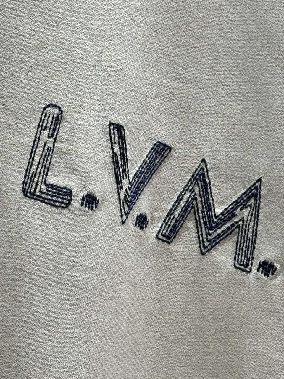 View 8 of Neutral Beige Luxe Tee: Soft Knit, Subtle LVM Monogram, Modern Fit