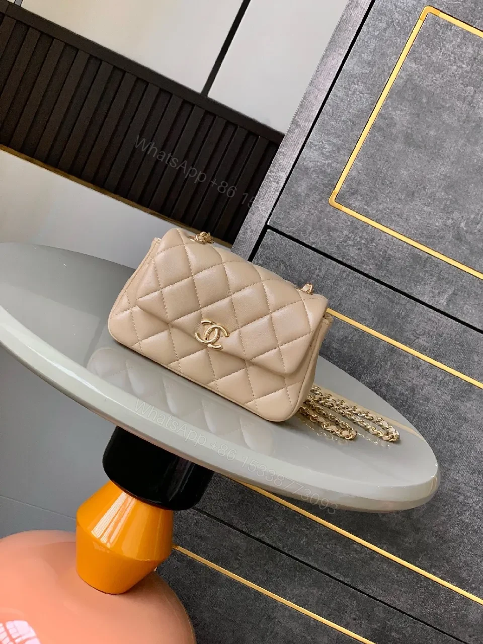 Quilted Mini Flap Bag: Neutral Leather, Gold Hardware, Classic Chic — view 1
