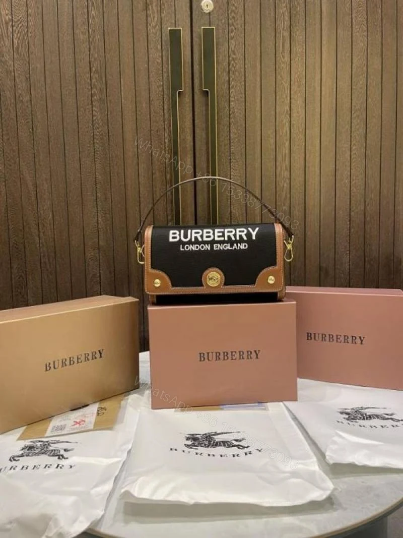 First Copy Burberry Black Mini Top Handle Bag With Logo Print And Premium Finish — view 1