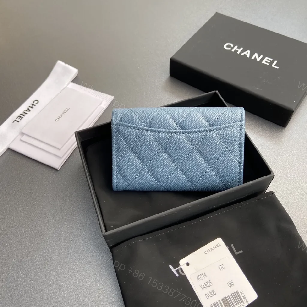 View 4 of Powder Blue Quilted Lambskin Wallet: Compact, Day-to-Night Chic