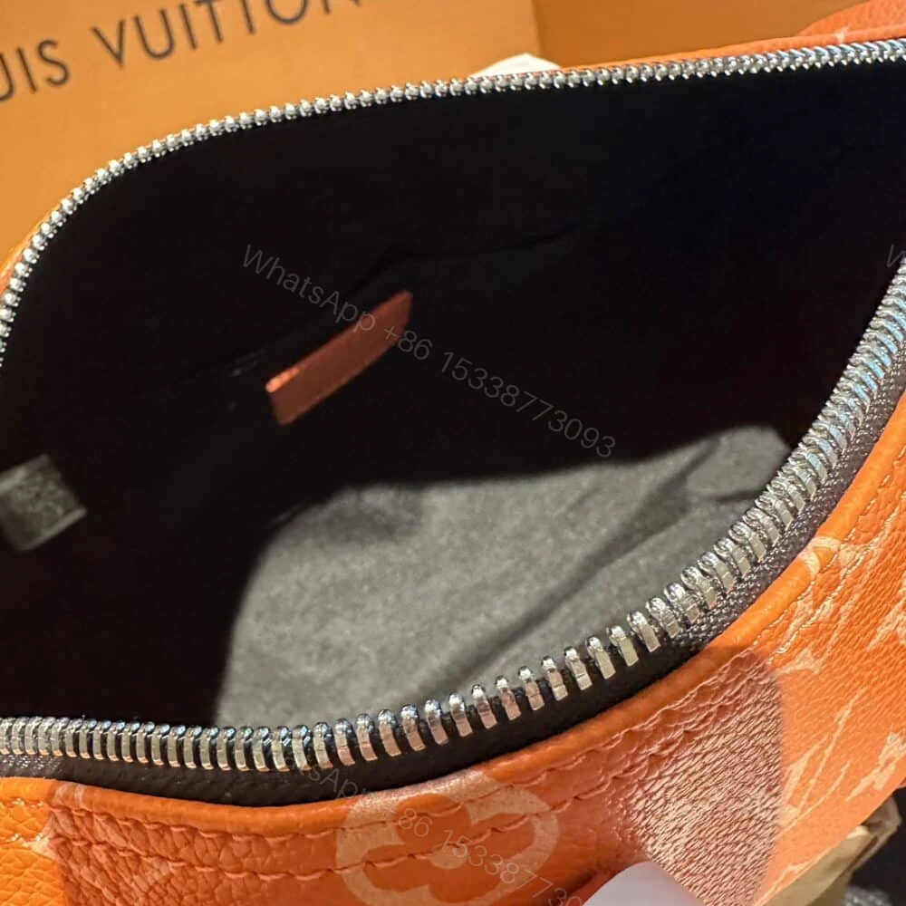 View 6 of Louis Vuitton Keepall Bandoulière 25 Tangerine 25Cm M31044