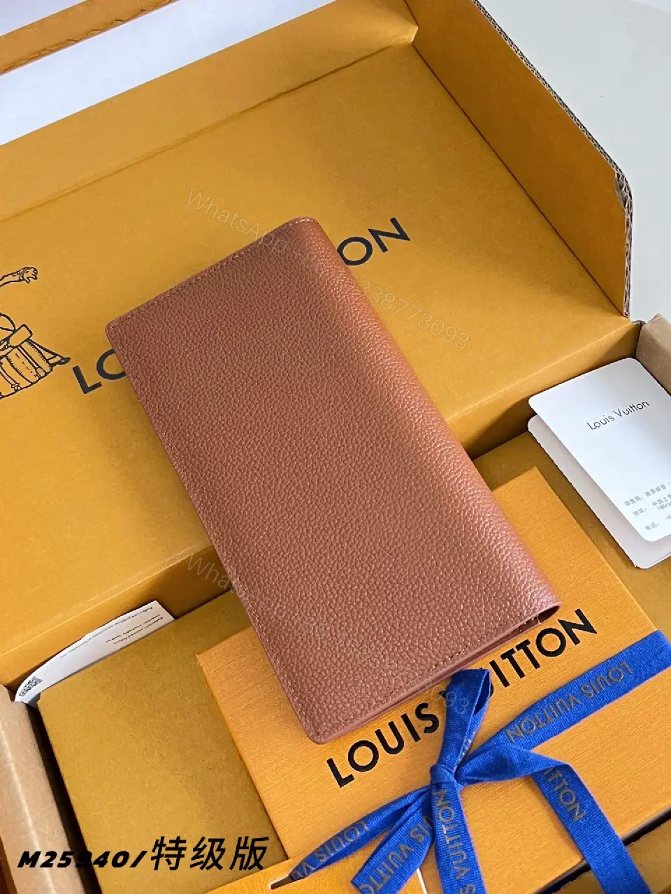 View 2 of Light Brown/Pale Pink Pebbled Leather Bi-Fold Wallet with LV Embossed Logo