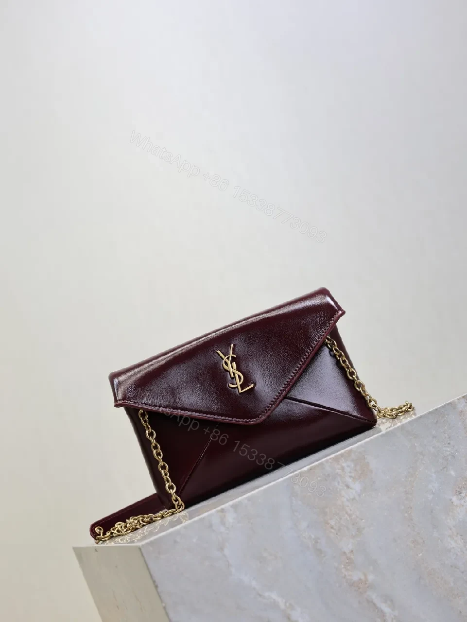 View 5 of Burgundy Leather Envelope Bag - Gold Hardware Elegance