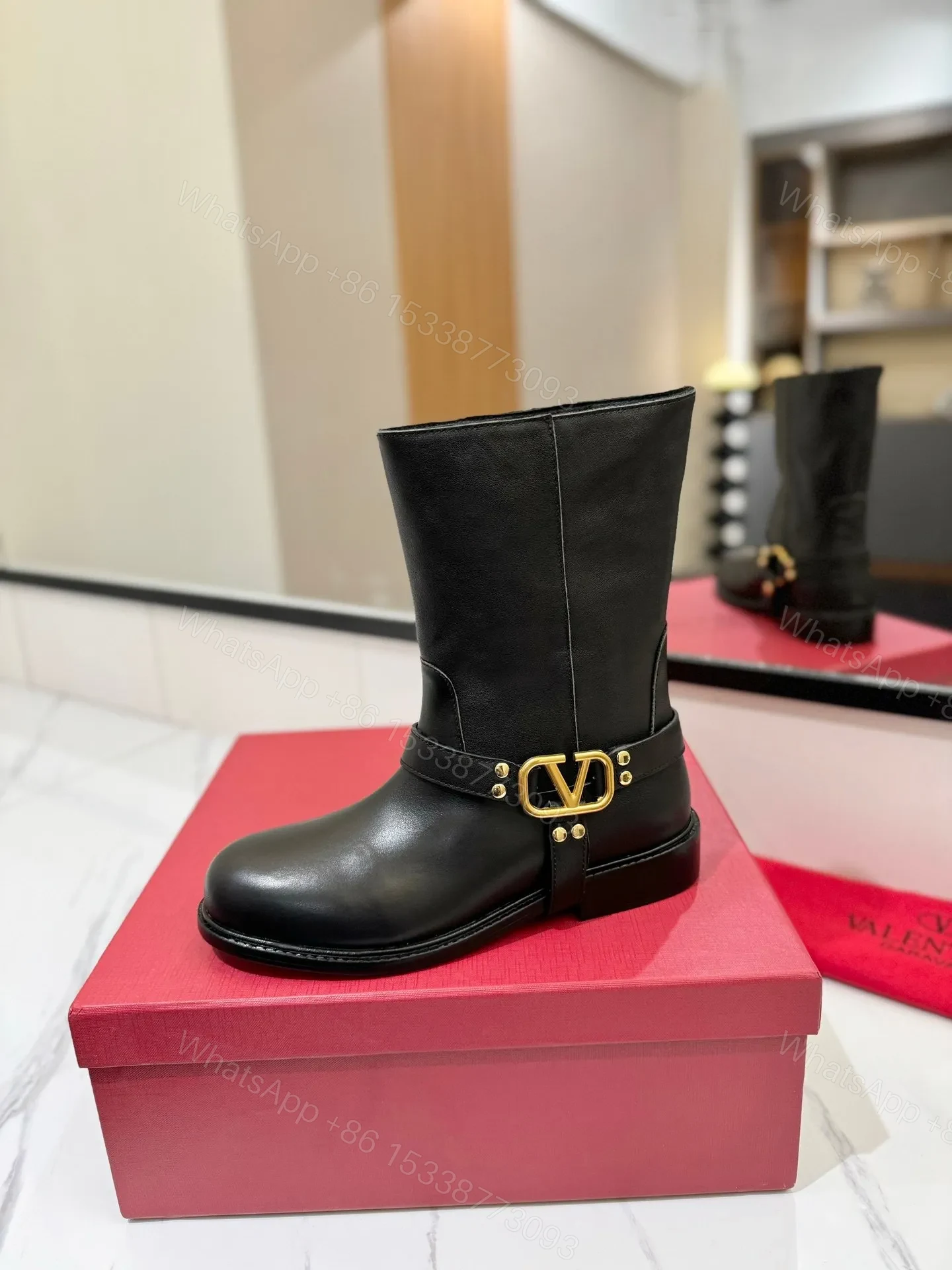 View 2 of Valentino Women Black Leather Mid-Calf Boots