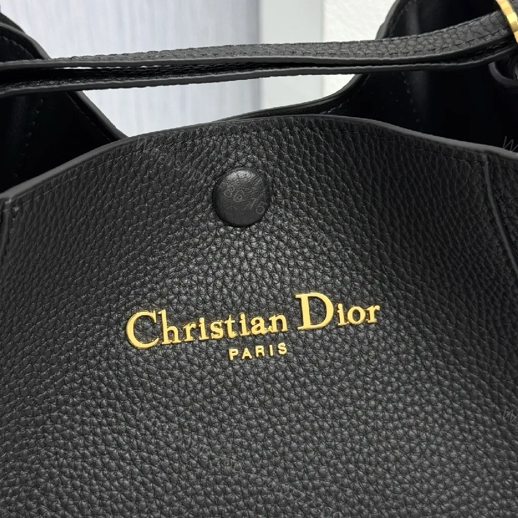 View 6 of Compact Black Pebbled Bucket Bag - Structured Luxury Everyday