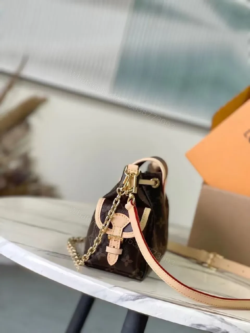 View 4 of Compact Monogram Crossbody Bag – Luxe Everyday Style