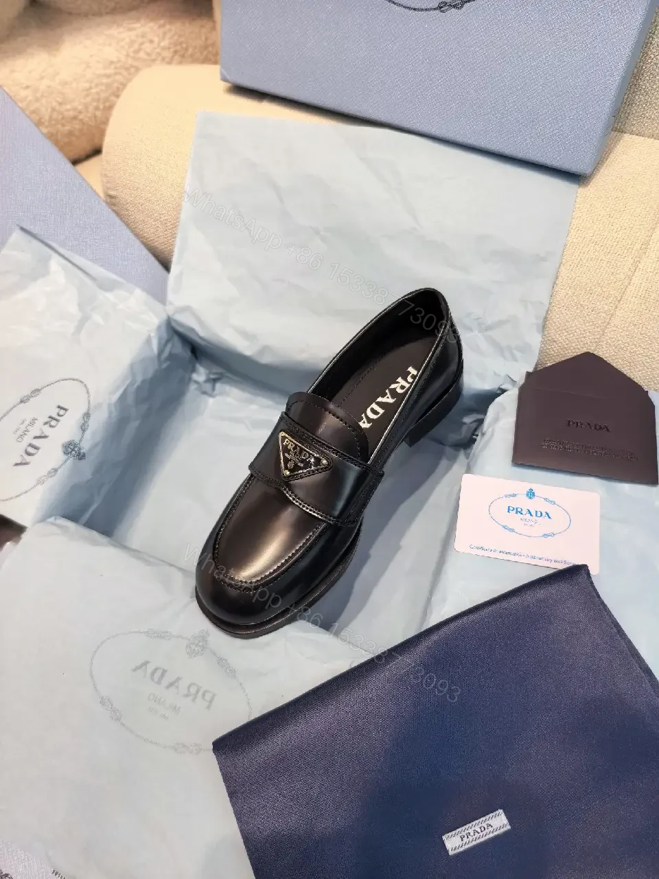 View 10 of Black Leather Prada Slippers with Logo Trim