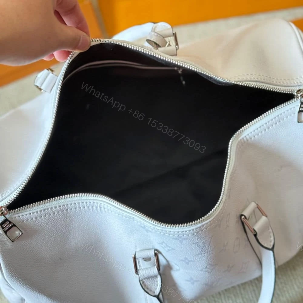 View 6 of Louis Vuitton Keepall 5 Bandouliere Optical White 40Cm M30885