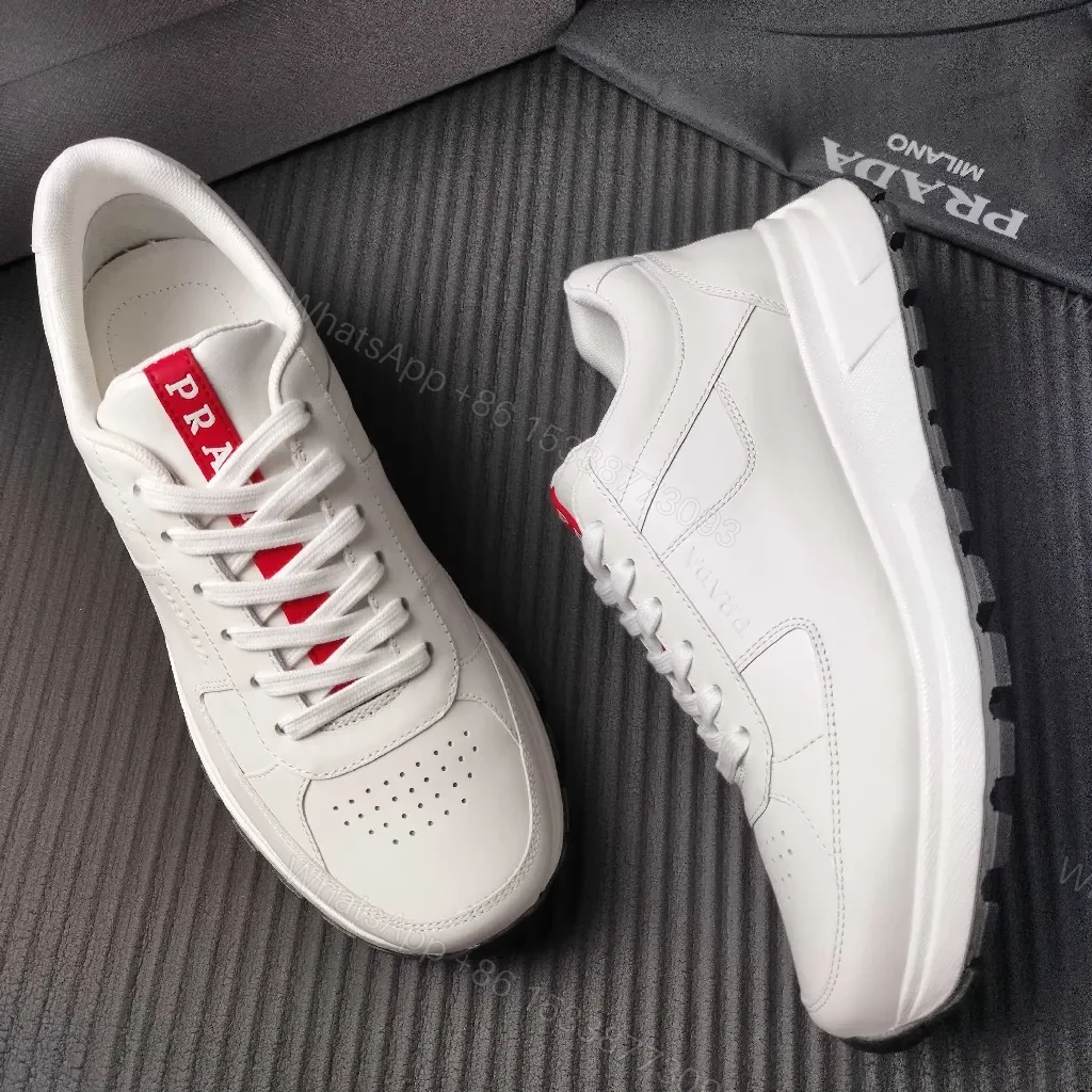 View 6 of Minimalist White Leather Trainers with Red Accent - Modern Comfort Lux
