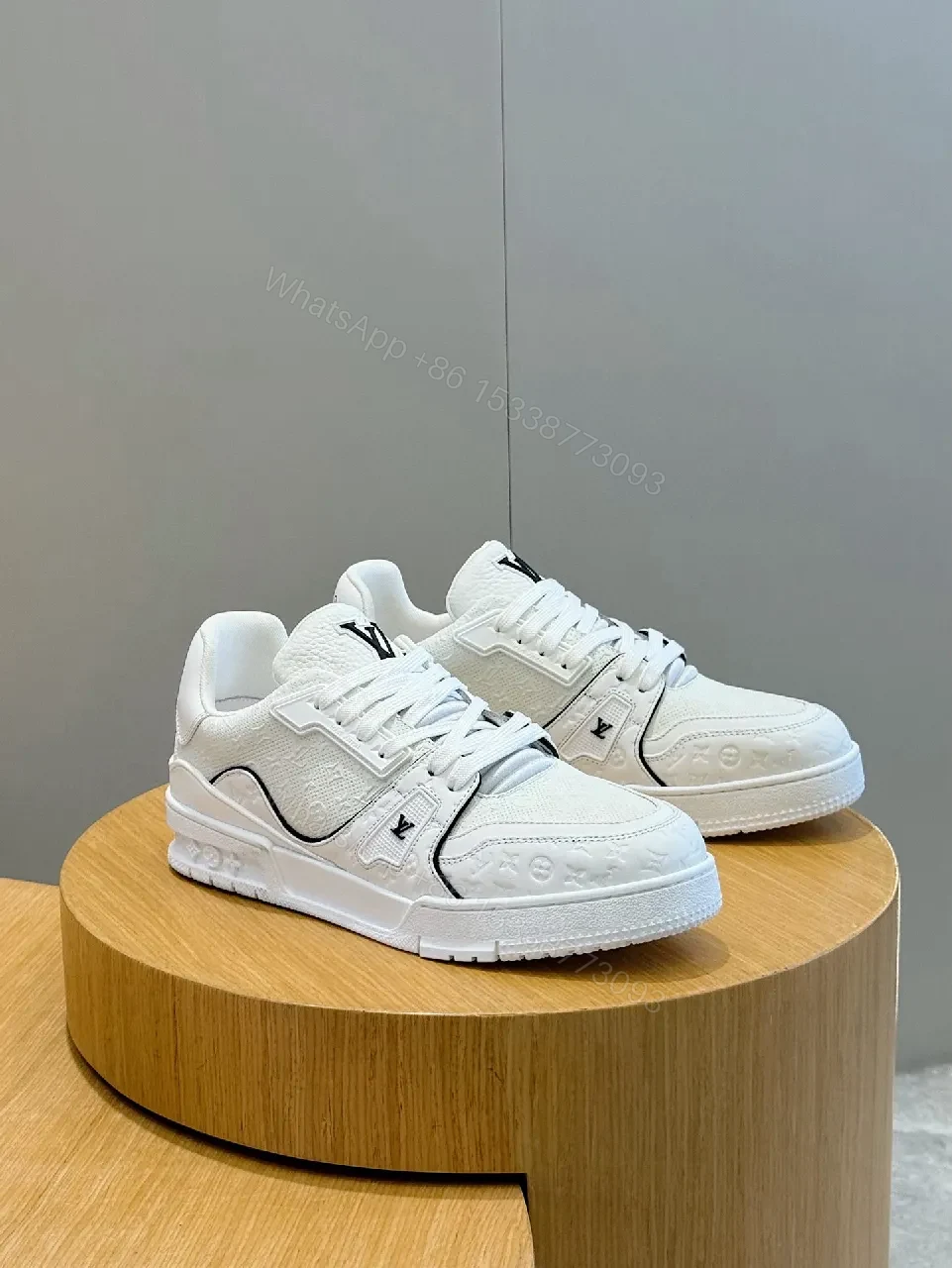 View 9 of White Leather Luxury Sneakers: Subtle Designer Edges, Comfort