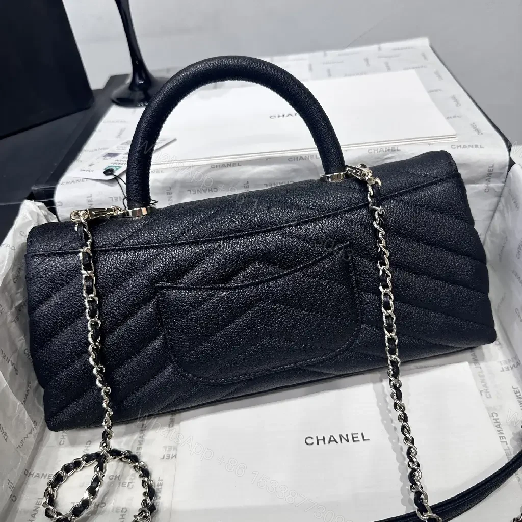 View 5 of Chic Quilted Leather Handbag: Gold Logo Compact Bag