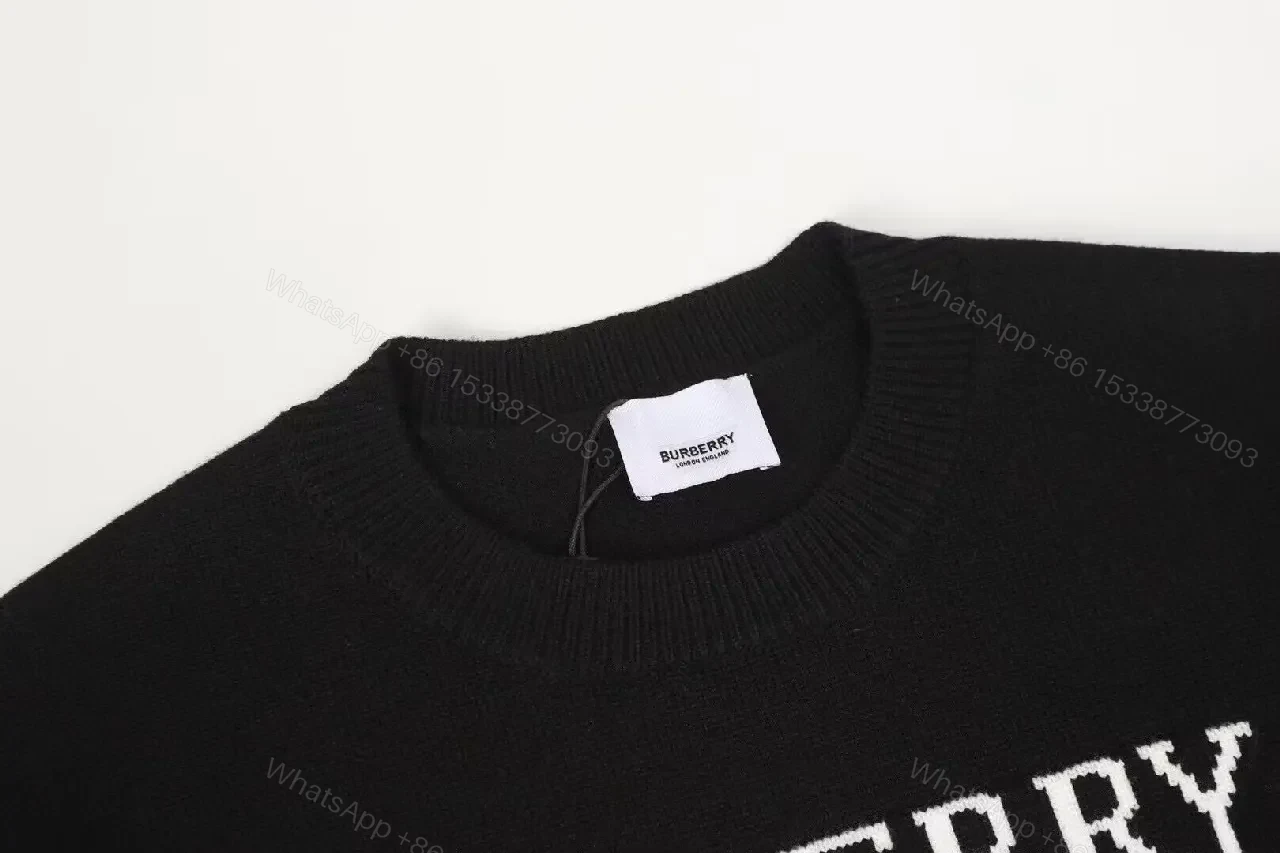 View 2 of Black Knit Crewneck with White Pony Graphic — Modern Comfort Sweater