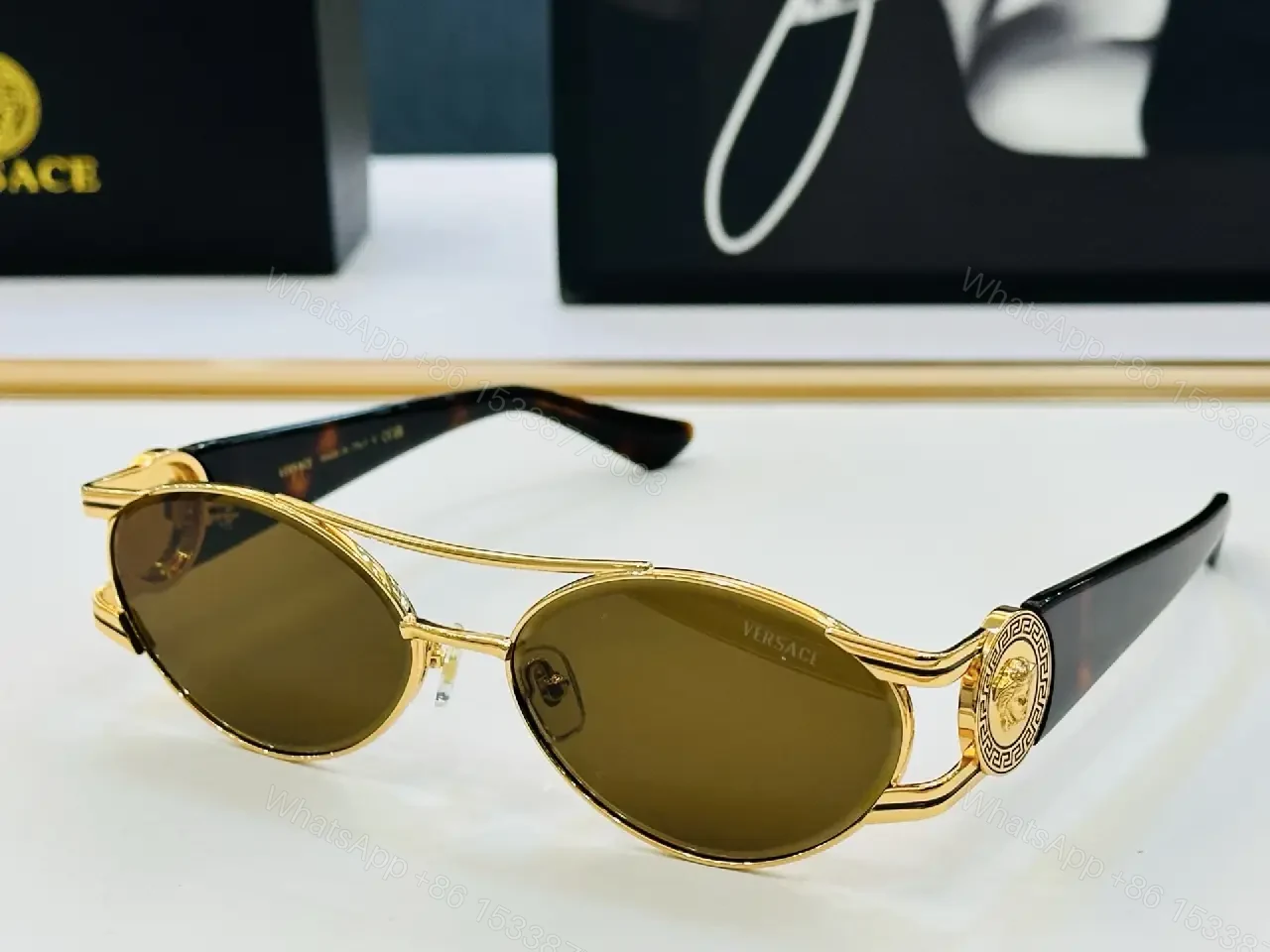 View 4 of Gold-Tone Frame Sunglasses: Luxe Comfort, Bold Attitude