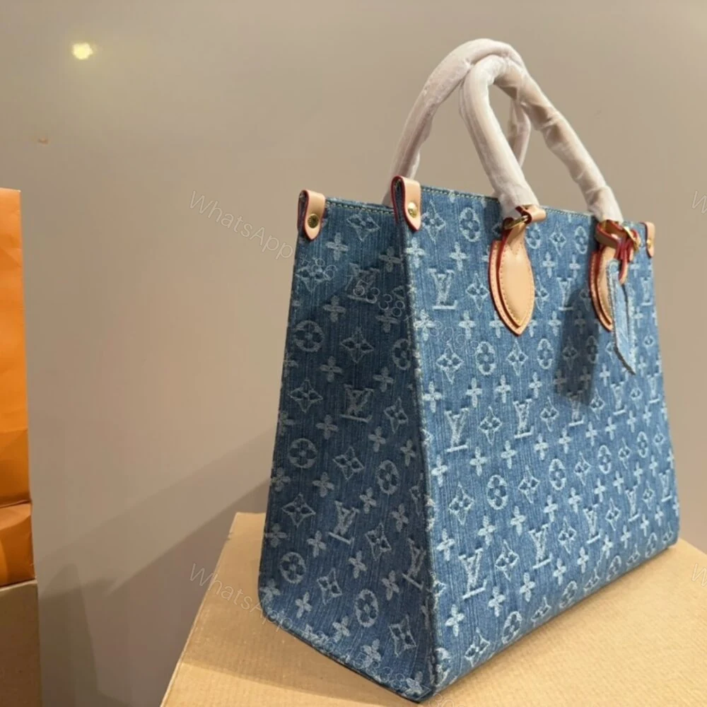 View 3 of Louis Vuitton New LV Remix Onthego MM Denim Blue 35Cm M46871