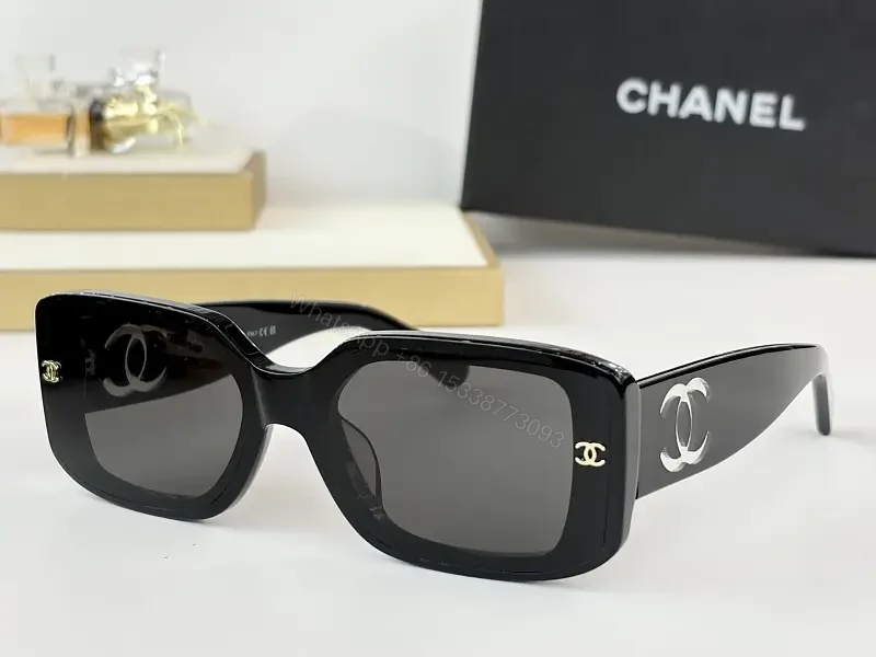 Bold Black Acetate Rectilinear Sunglasses, Gold Accents, UV400 Protection — view 1