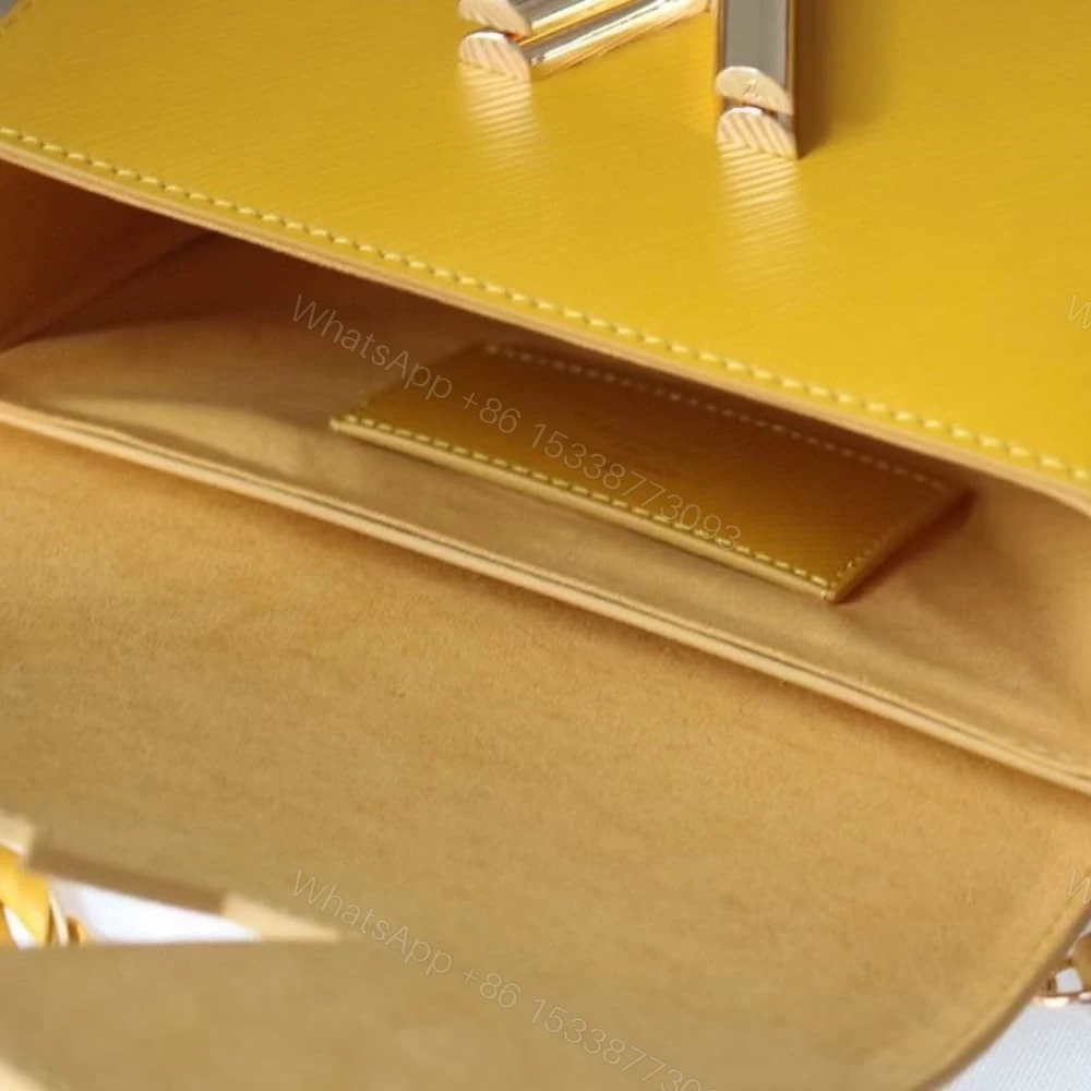 View 9 of Louis Vuitton LV Twist MM Handbag Sunflower Yellow 23Cm