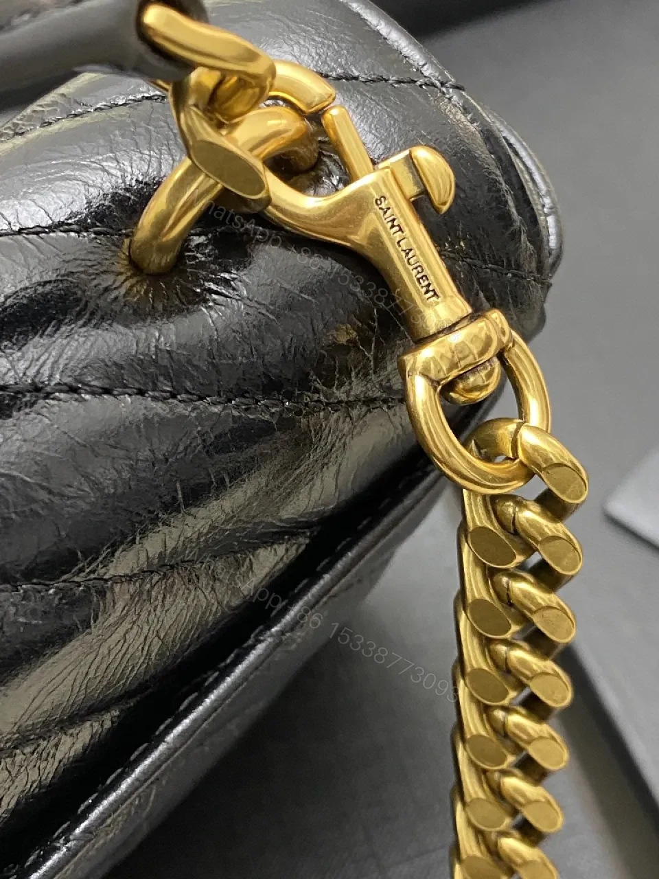 View 2 of Chic Quilted Crossbody: Black Leather, Gold Hardware, Compact Luxury