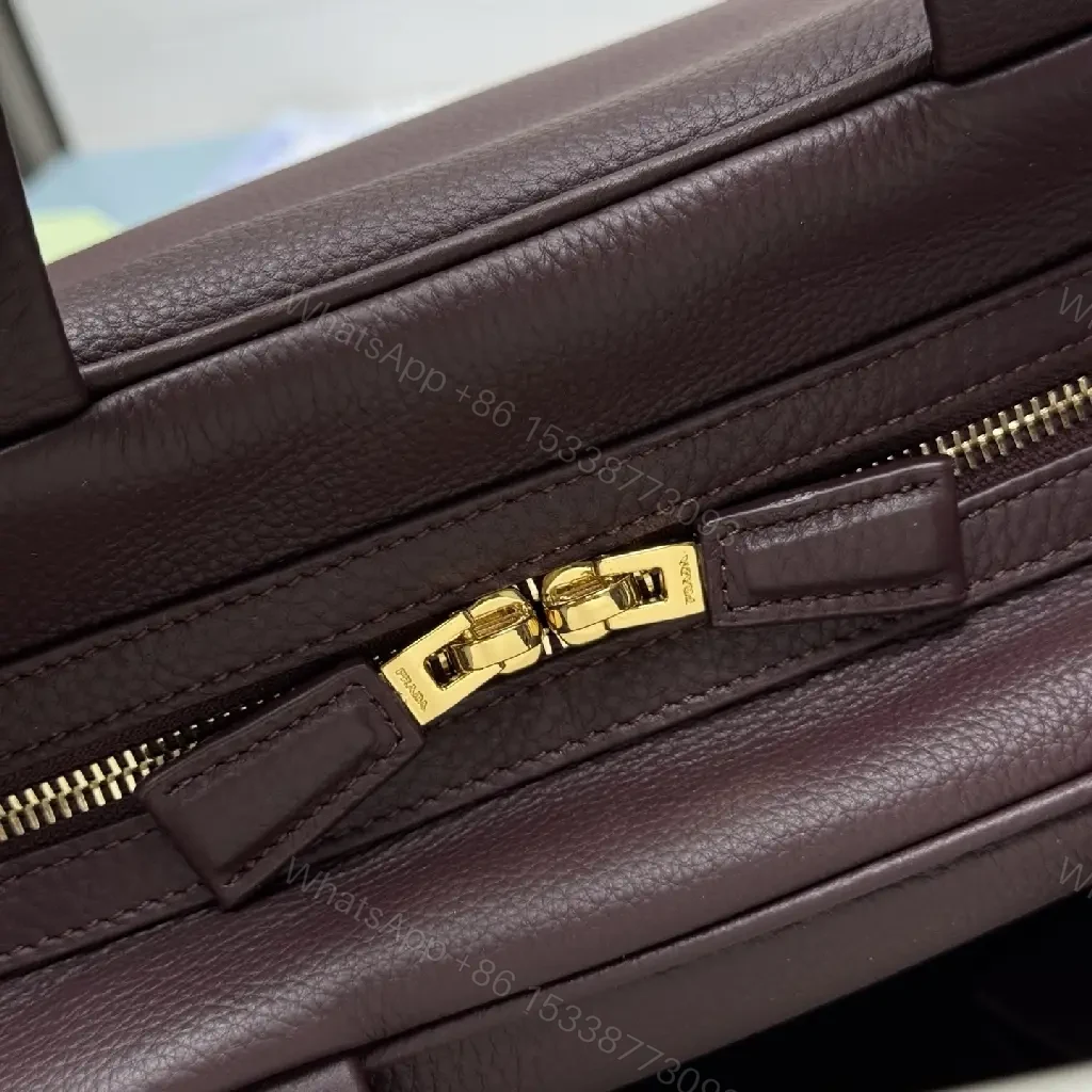 View 5 of Structured Burgundy Pebble-Leather City Bag with Gold Hardware