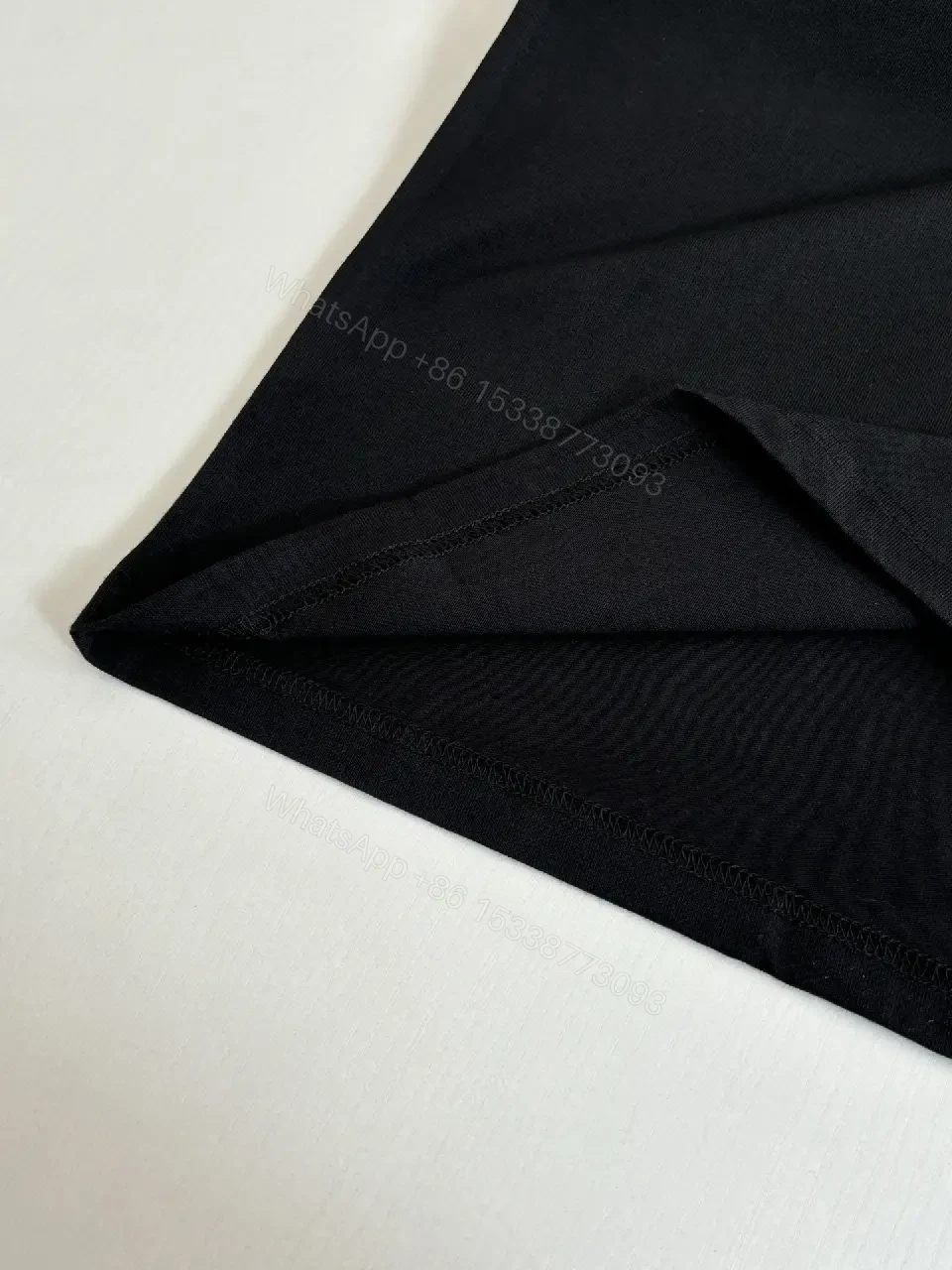 View 4 of Black Cotton Tee, Minimal Logo, Elevated Streetwear, All-Day Comfort, Tee