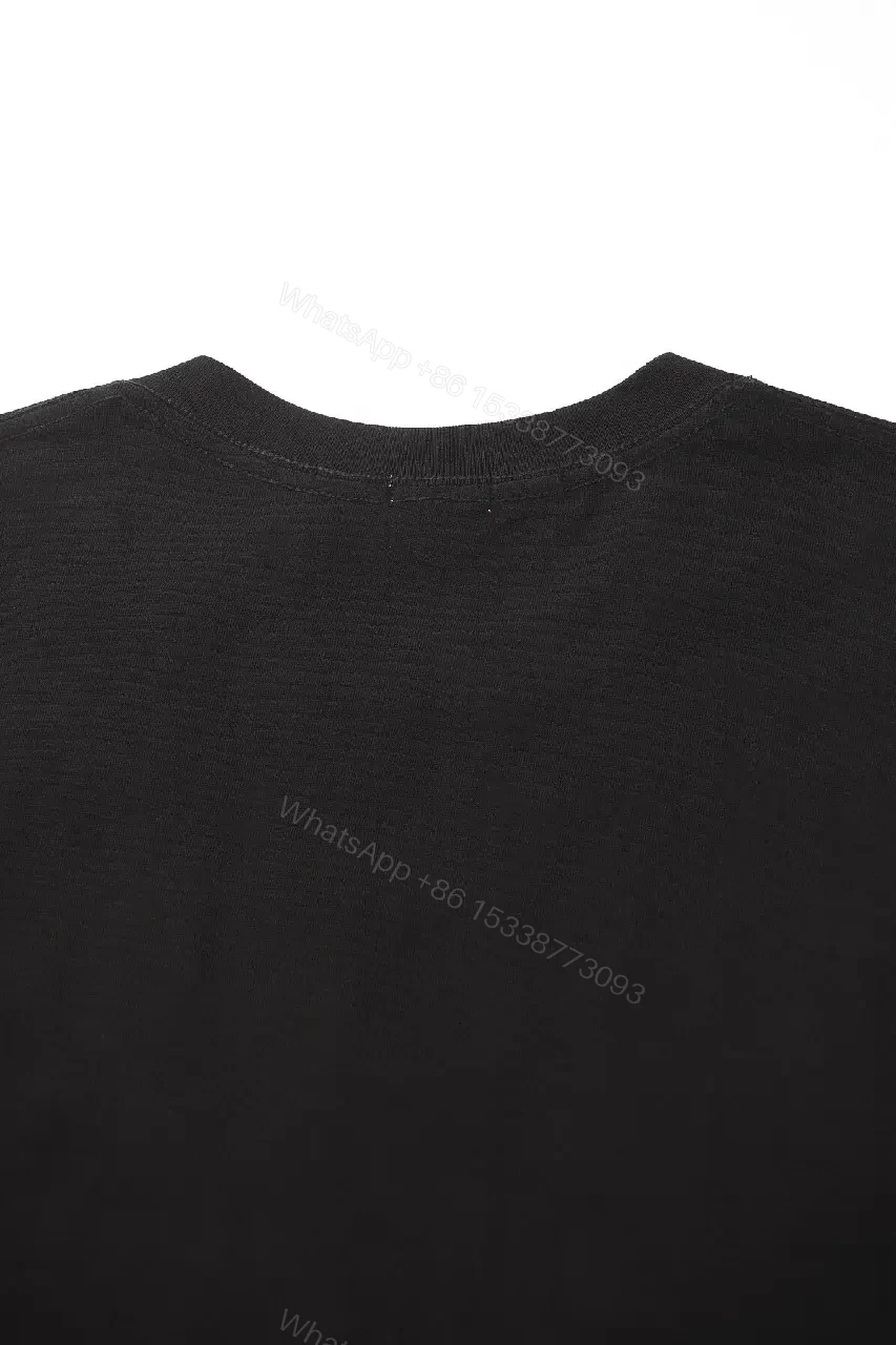 View 4 of Black Cotton Tee — Premium Comfort, Subtle Signature Detail, Modern Fit