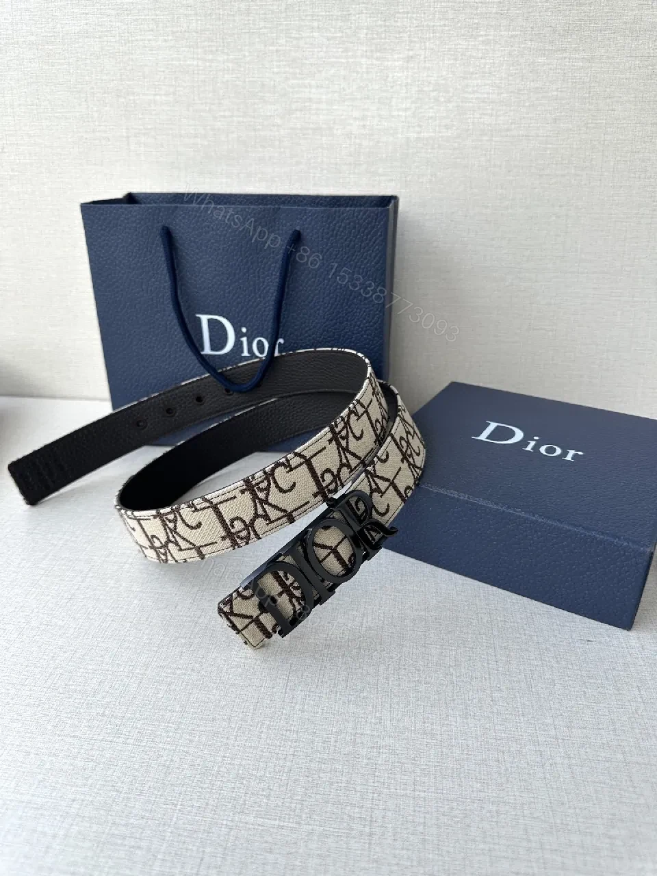 View 8 of Monogram Canvas Belt with Gold Logo Buckle, Black Interior