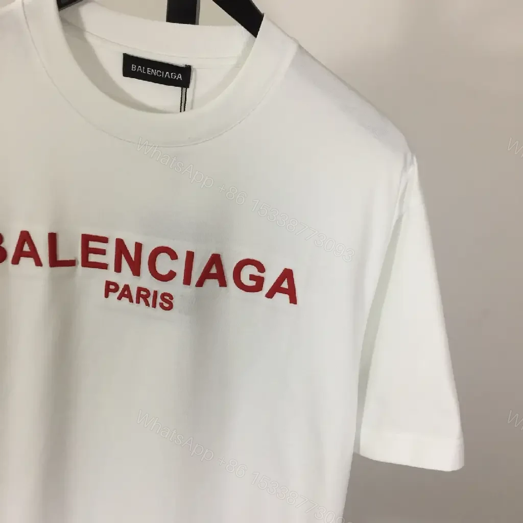 View 2 of Minimalist White Logo Tee with Bold Red Crest