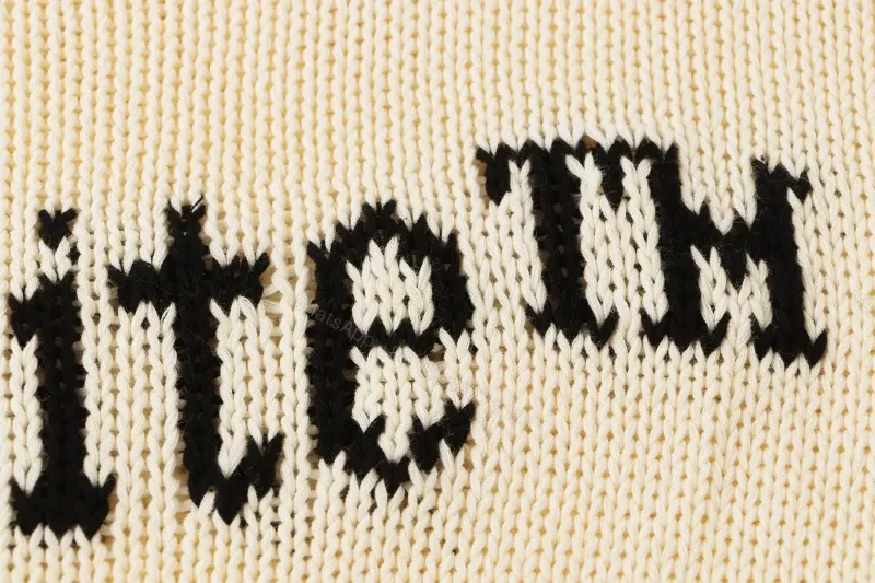 View 5 of Ivory Knit Crewneck with Bold Logo - Elevated Everyday Luxury