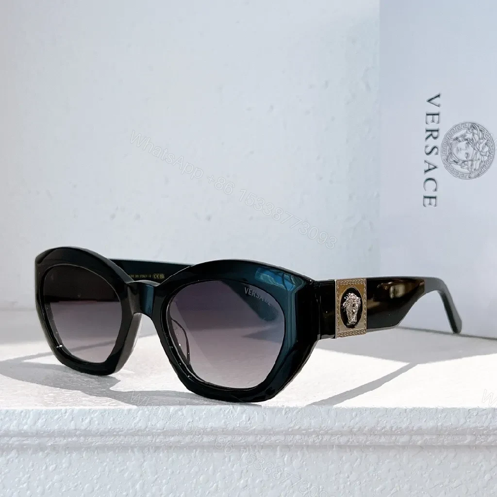 View 3 of Bold Tortoise Cat-Eye Sunglasses with Gold Medallion Accents