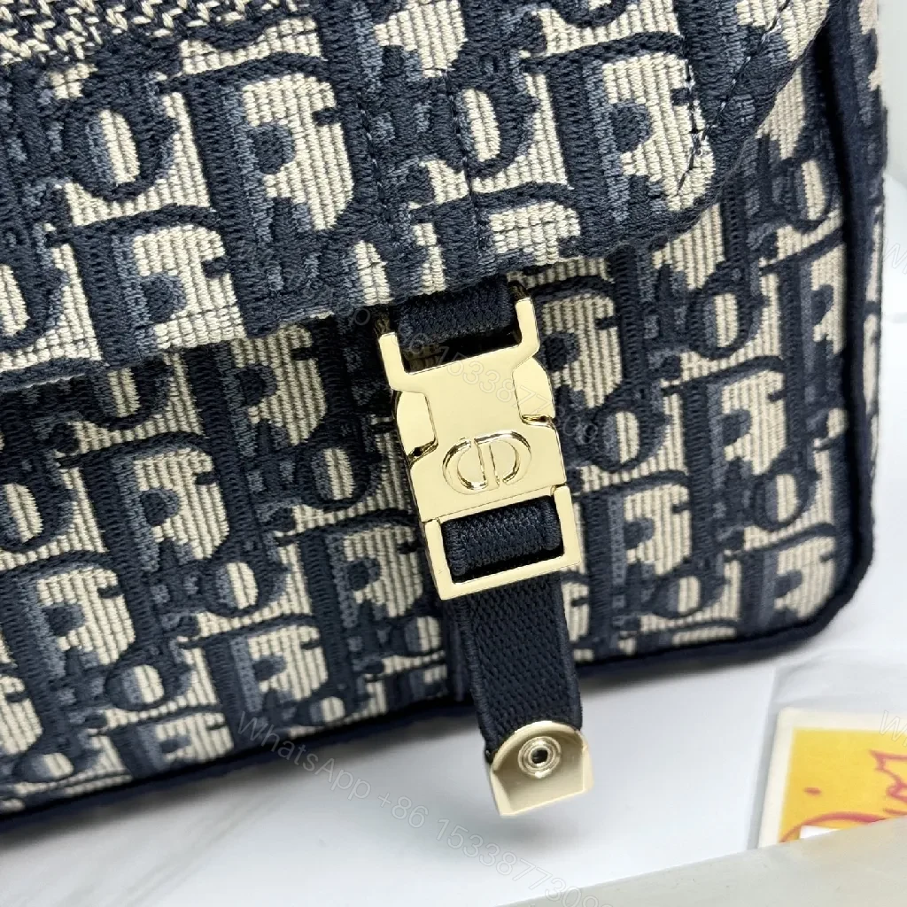 View 9 of Compact Monogram Crossbody: Luxe, Structured, Everyday News