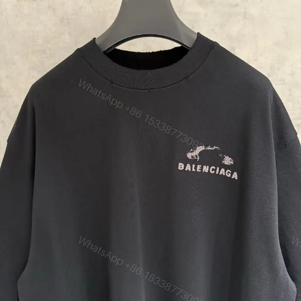 View 2 of Black Cotton Tee - Oversized Relaxed Fit with Embroidered Logo