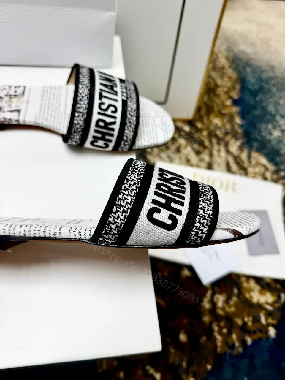 View 9 of white textile slide sandal with monogram pattern luxury logo strap for everyday luxury