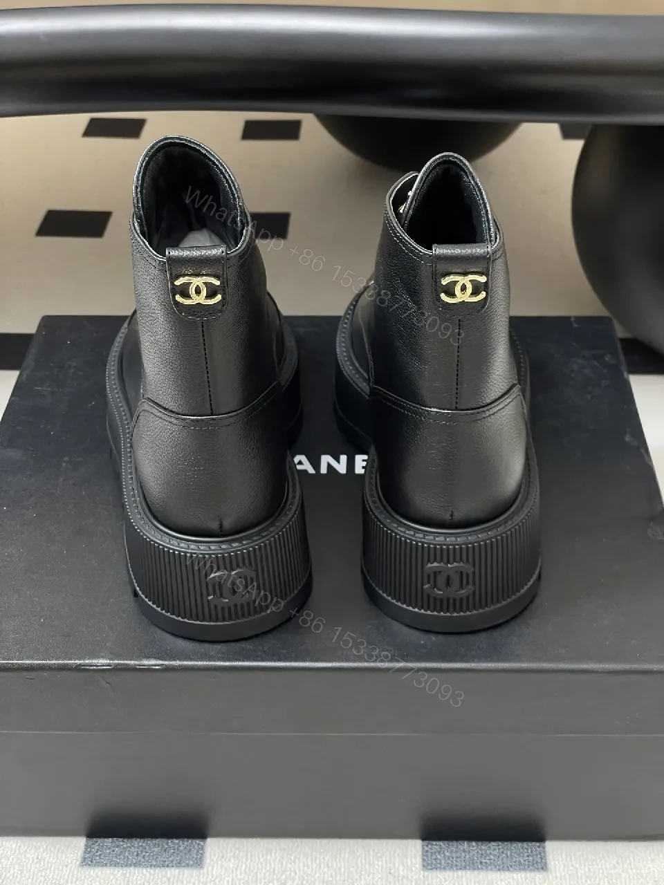 View 6 of Black Leather Combat Boots with Gold Branding Feature