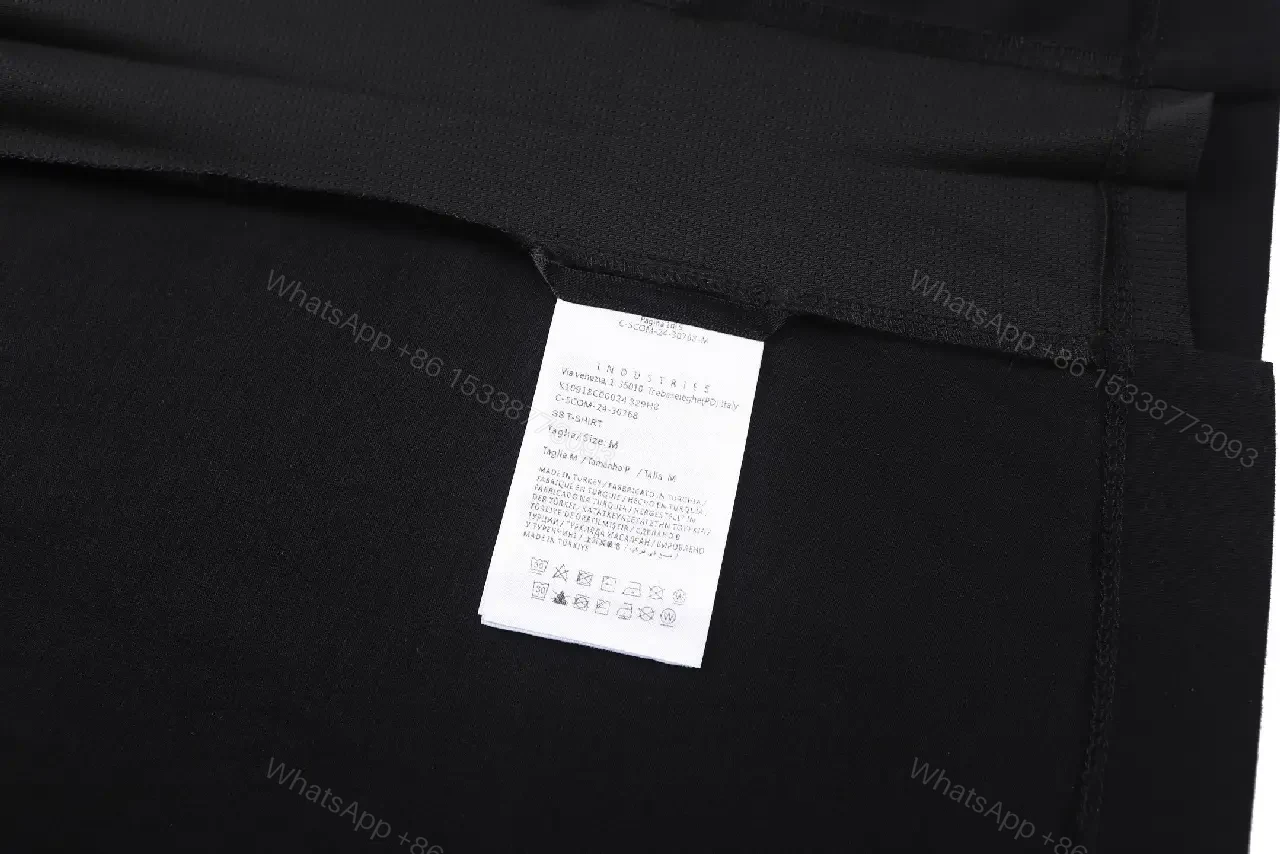 View 9 of Minimalist Black Cotton Tee – Elevated Everyday Essential, Relaxed Fit