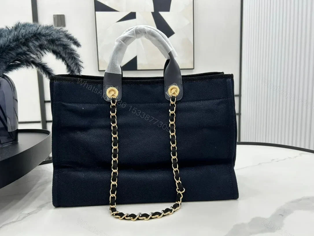 View 5 of CHANEL DEAUVILLE LARGE 38 TOTE BAG IN BLACK CANVAS WITH GOLD EMBROIDERED LOGO