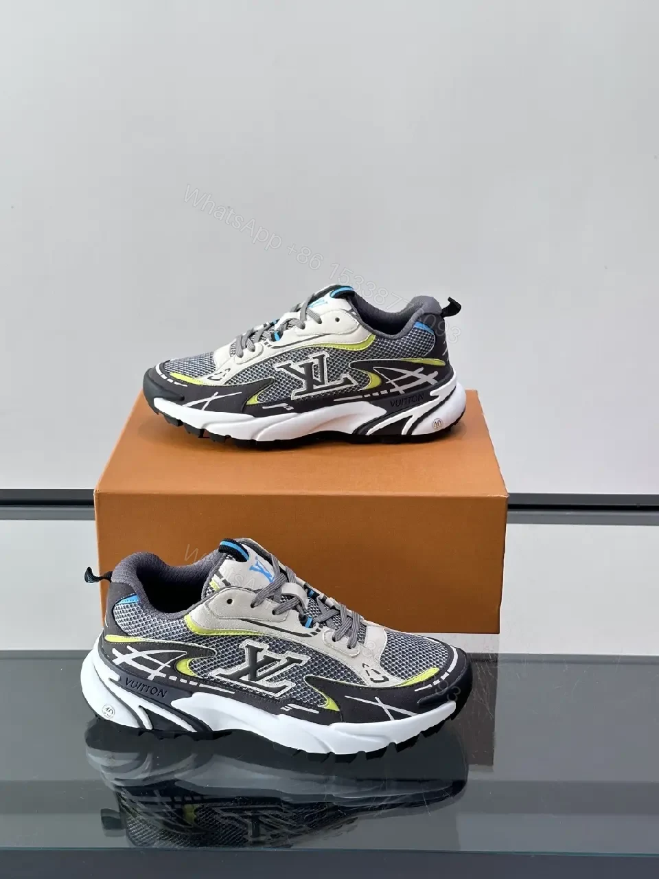 View 7 of Gray/Black Mesh Leather Sneaker with LV Accents, Sporty Chunky Style