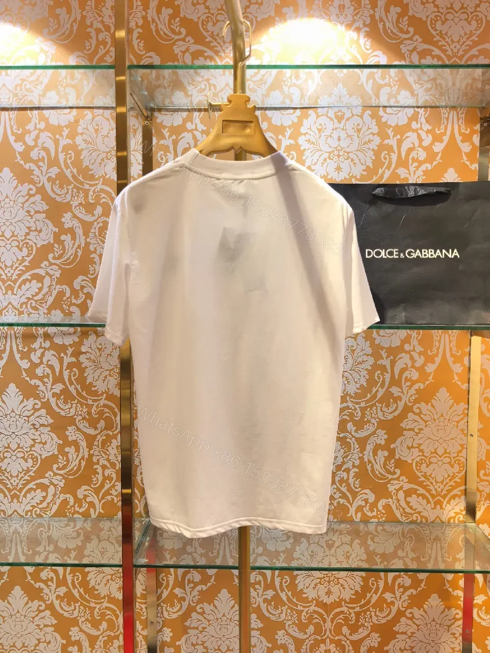 View 7 of Minimalist White Cotton Tee with Subtle Front Logo and Patches