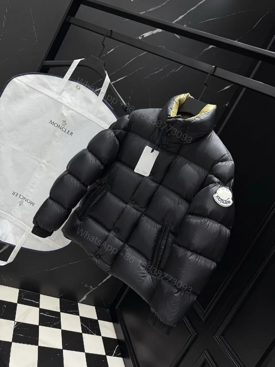 View 2 of Puffer Perfection: Short Black Down Jacket with Moncler Patch