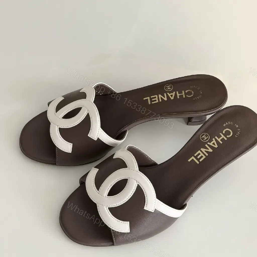 View 8 of Brown Leather Slides White Logo Interlock Chanel Sliders