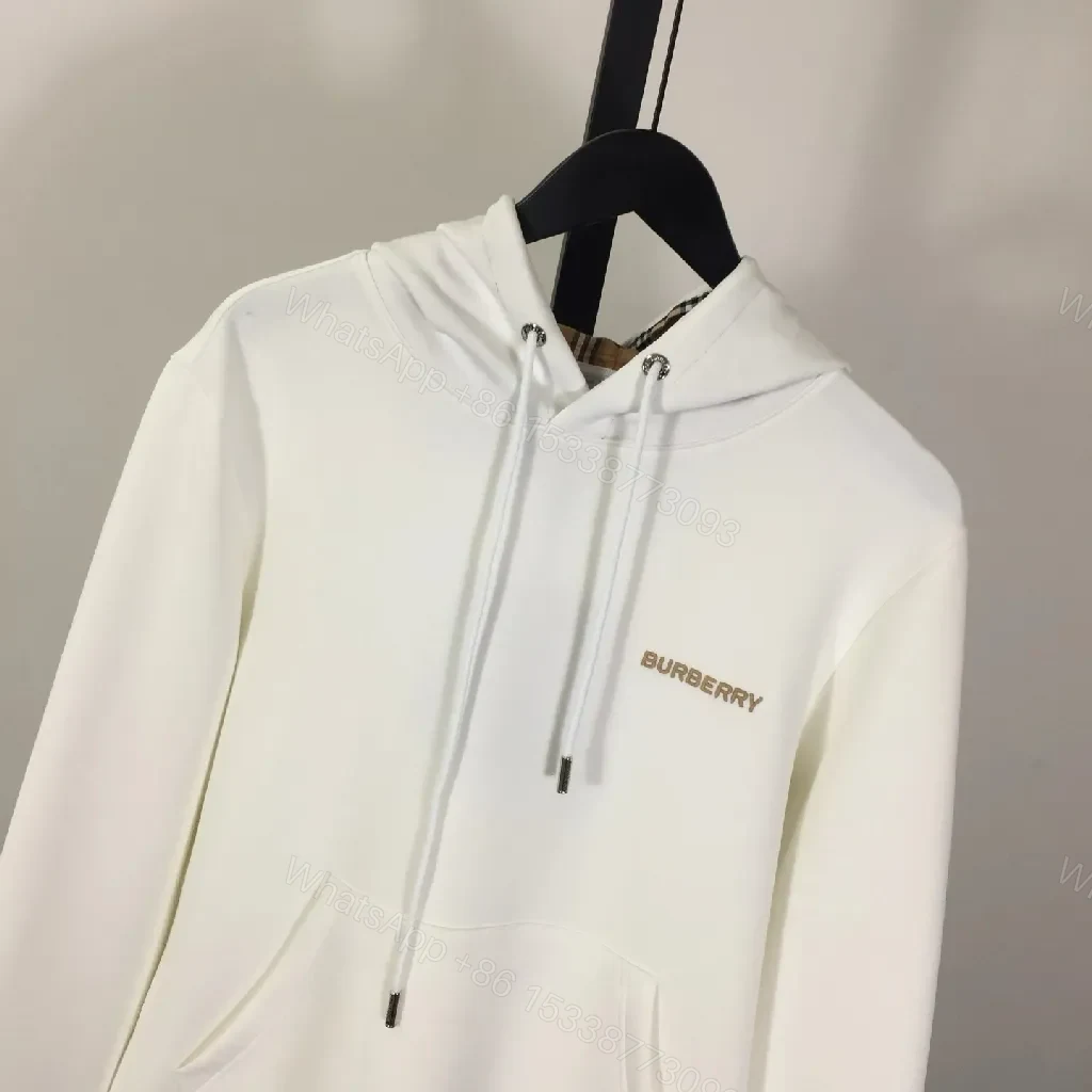 View 4 of Minimalist Off-White Hoodie with Subtle Logo Design