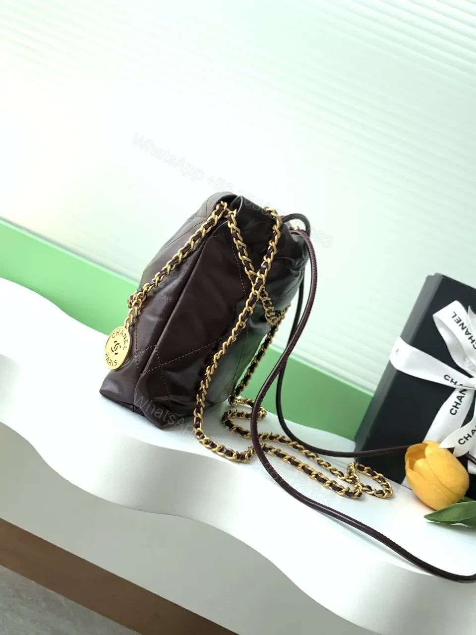 View 5 of Gold-Traced Quilted Bucket Bag: Luxury Leather, Iconic Hardware