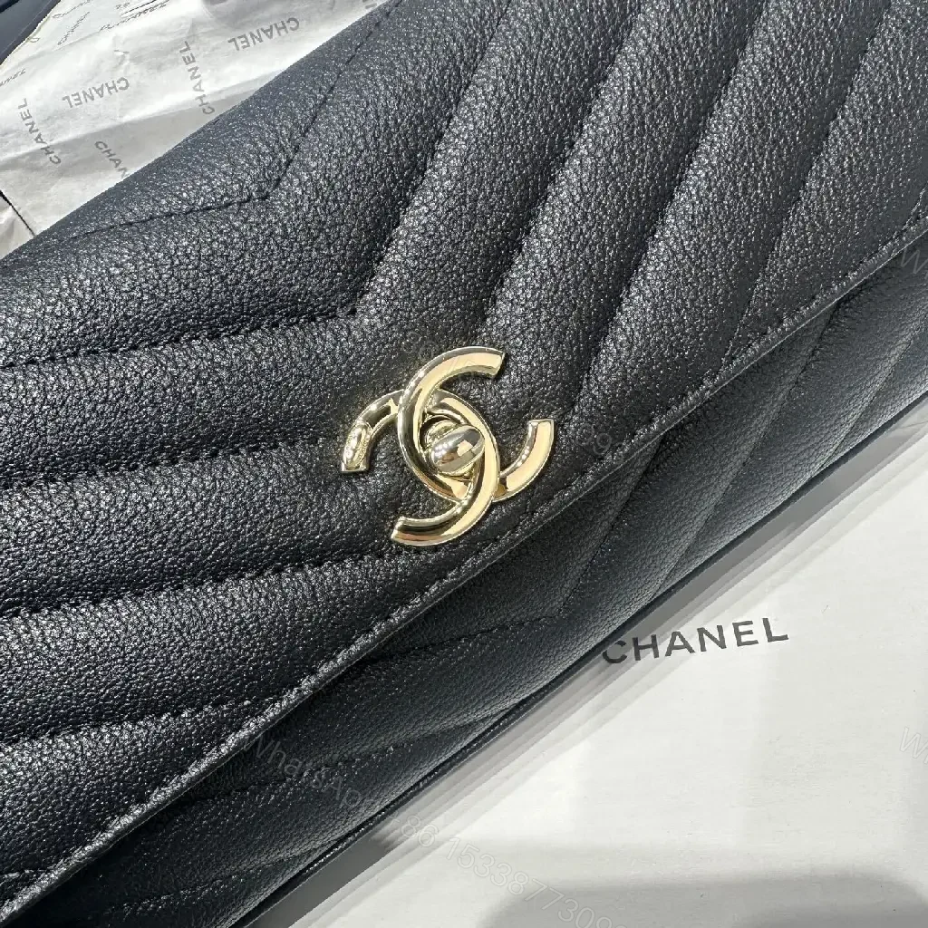 View 8 of Chic Quilted Leather Handbag: Gold Logo Compact Bag