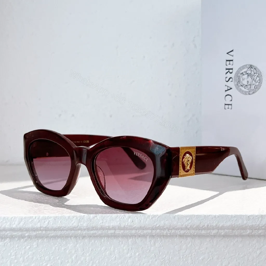 View 9 of Bold Tortoise Cat-Eye Sunglasses with Gold Medallion Accents