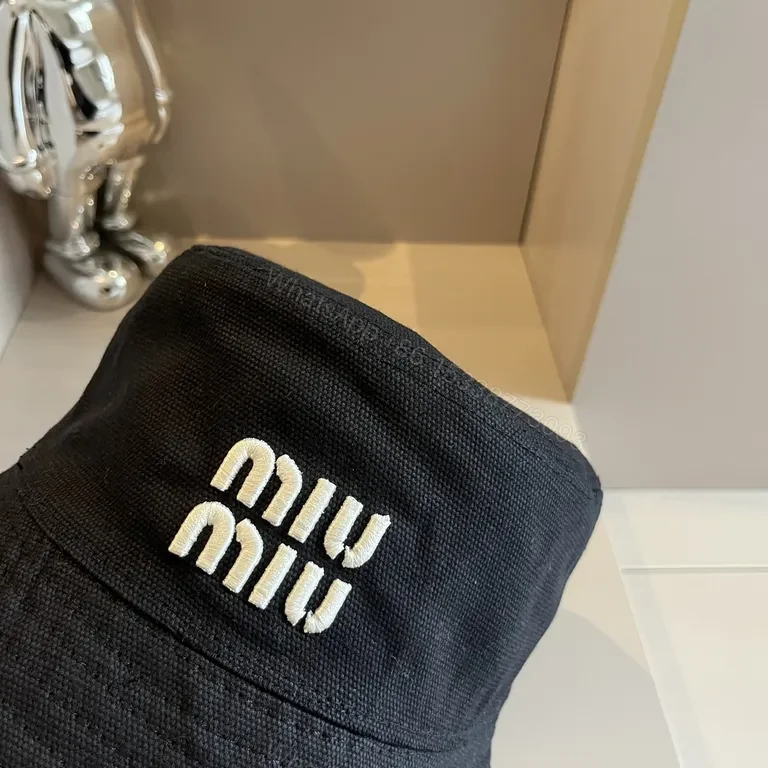 View 4 of Black Cotton-Twill Bucket Hat: Subtle Logo, Everyday Luxe