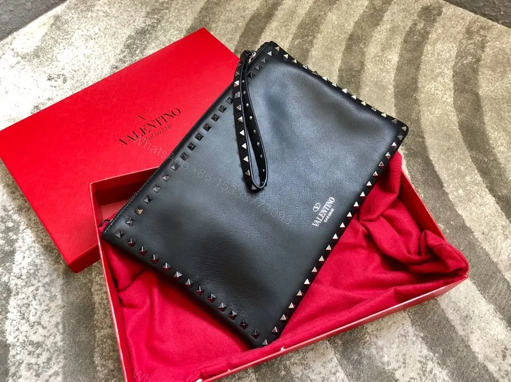 View 7 of Valentino Rockstud Leather Clutch: Day-to-Night Elegance
