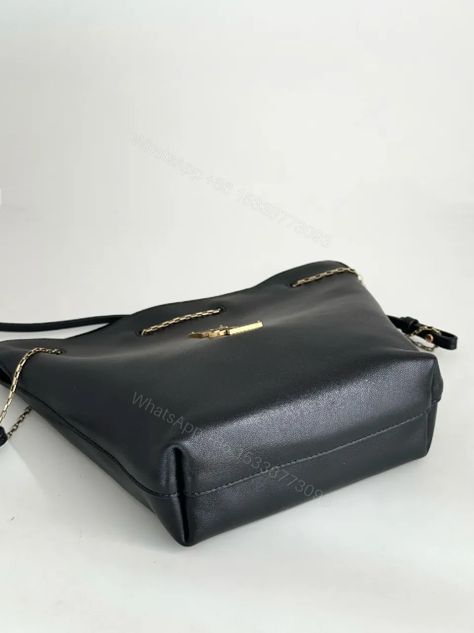 View 4 of Chic Black Leather Bucket Bag with Gold Logo