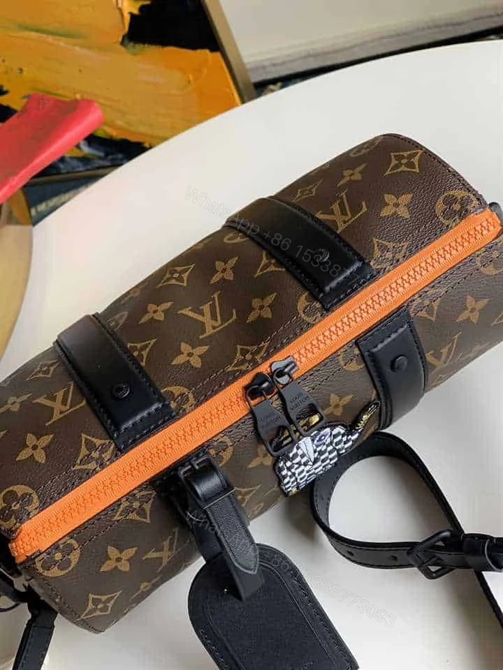 View 7 of LOUIS VUITTON CITY KEEPALL MONOGRAM CANVAS OTHER IN BROWN M45652
