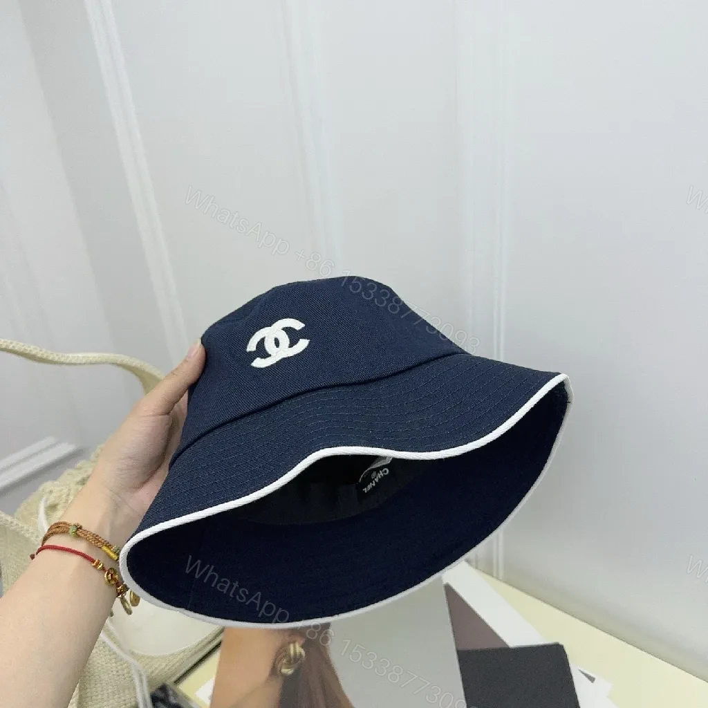 View 2 of Signature Texture Bucket Hat - Luxe, Weather-Ready Style