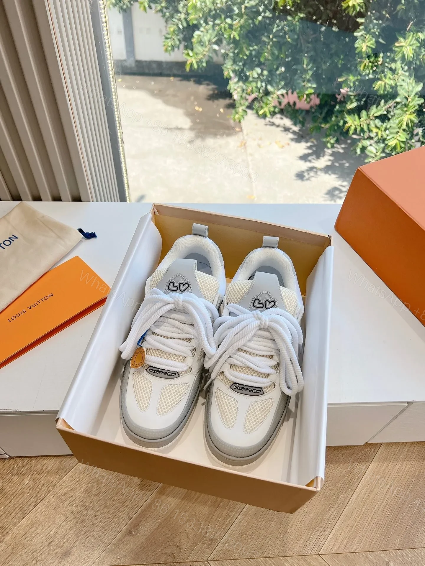 View 3 of LV Women White Mesh And Leather Sneakers
