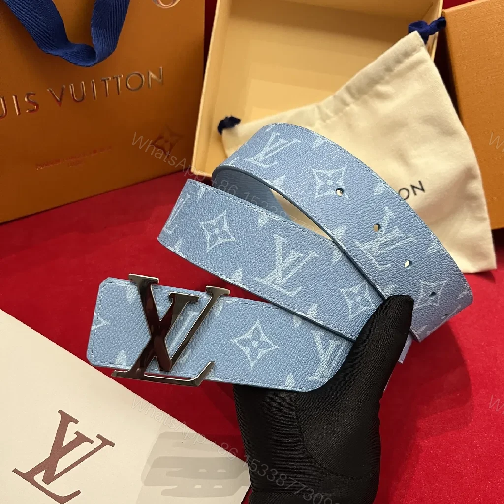 View 2 of Light-Blue Pebbled Leather Belt with Monogram Detail